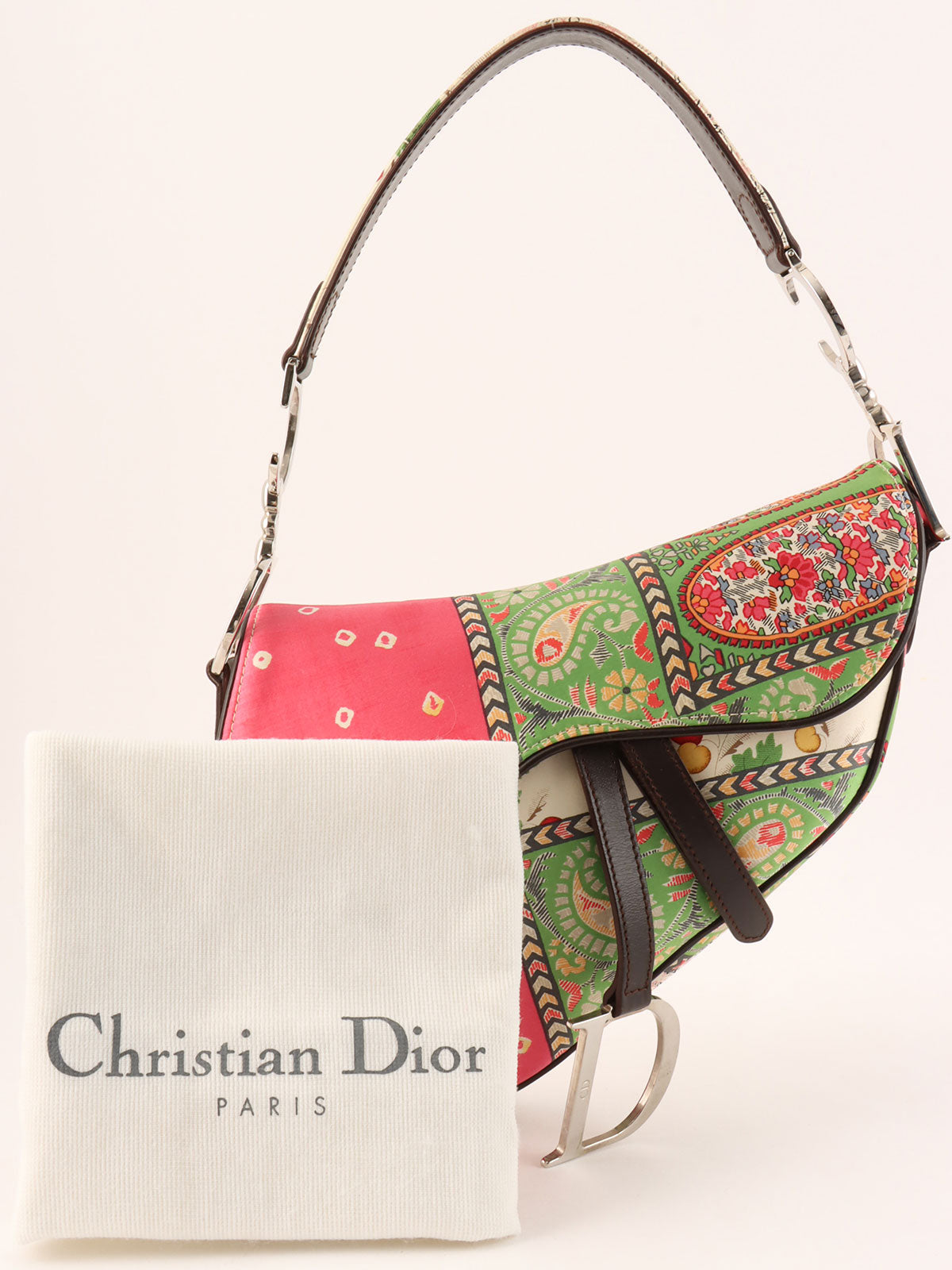 Paisley pattern saddlebag in pink, green, and white