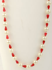 Pink pearl color stone necklace in white/red