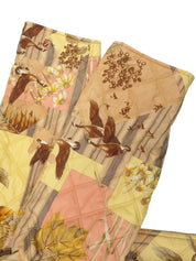 Bird and flower pattern quilted jacket in beige, yellow, and pink