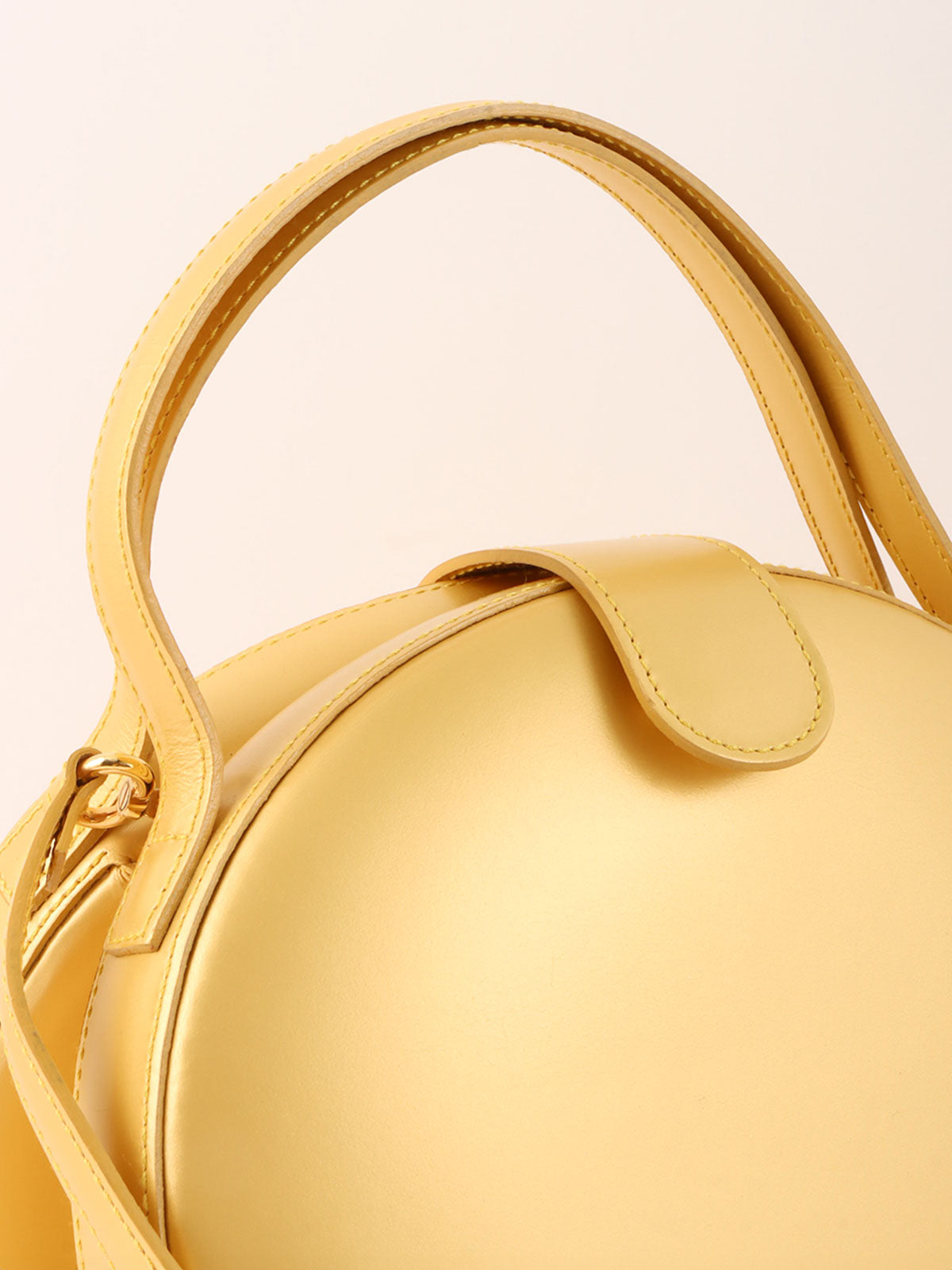 Round Anagram Embossed 2-Way Bag, Gold