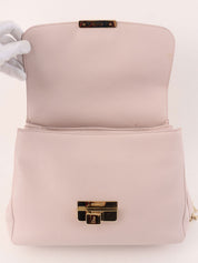 Leather logo plate chain shoulder bag in baby pink