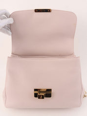 Leather logo plate chain shoulder bag in baby pink