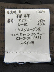 ウールロゴボタンノーカラージャケット　ブラック