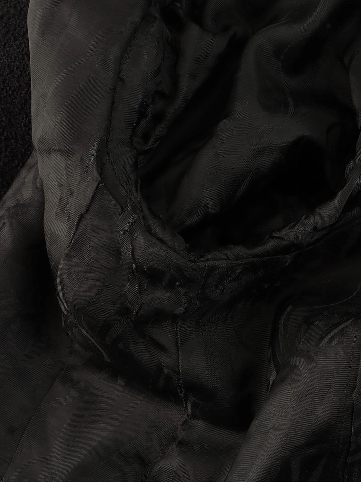 Wool logo button long jacket in black