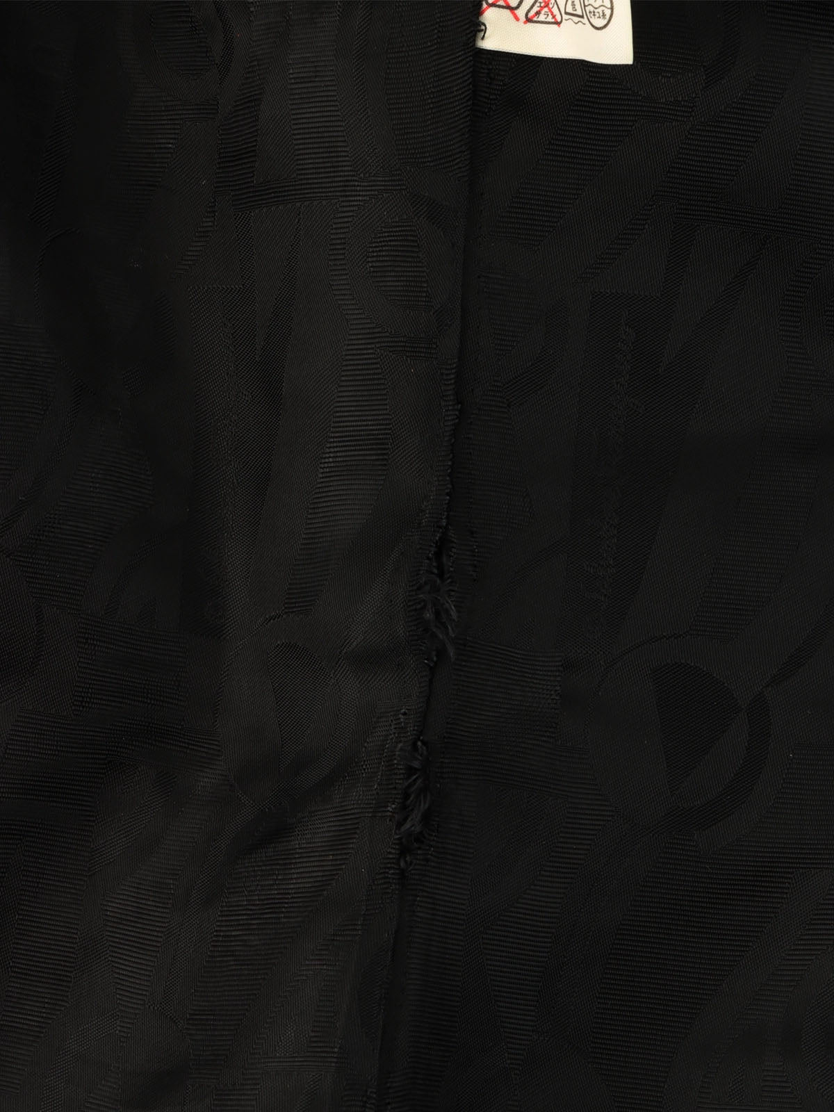 Wool logo button long jacket in black