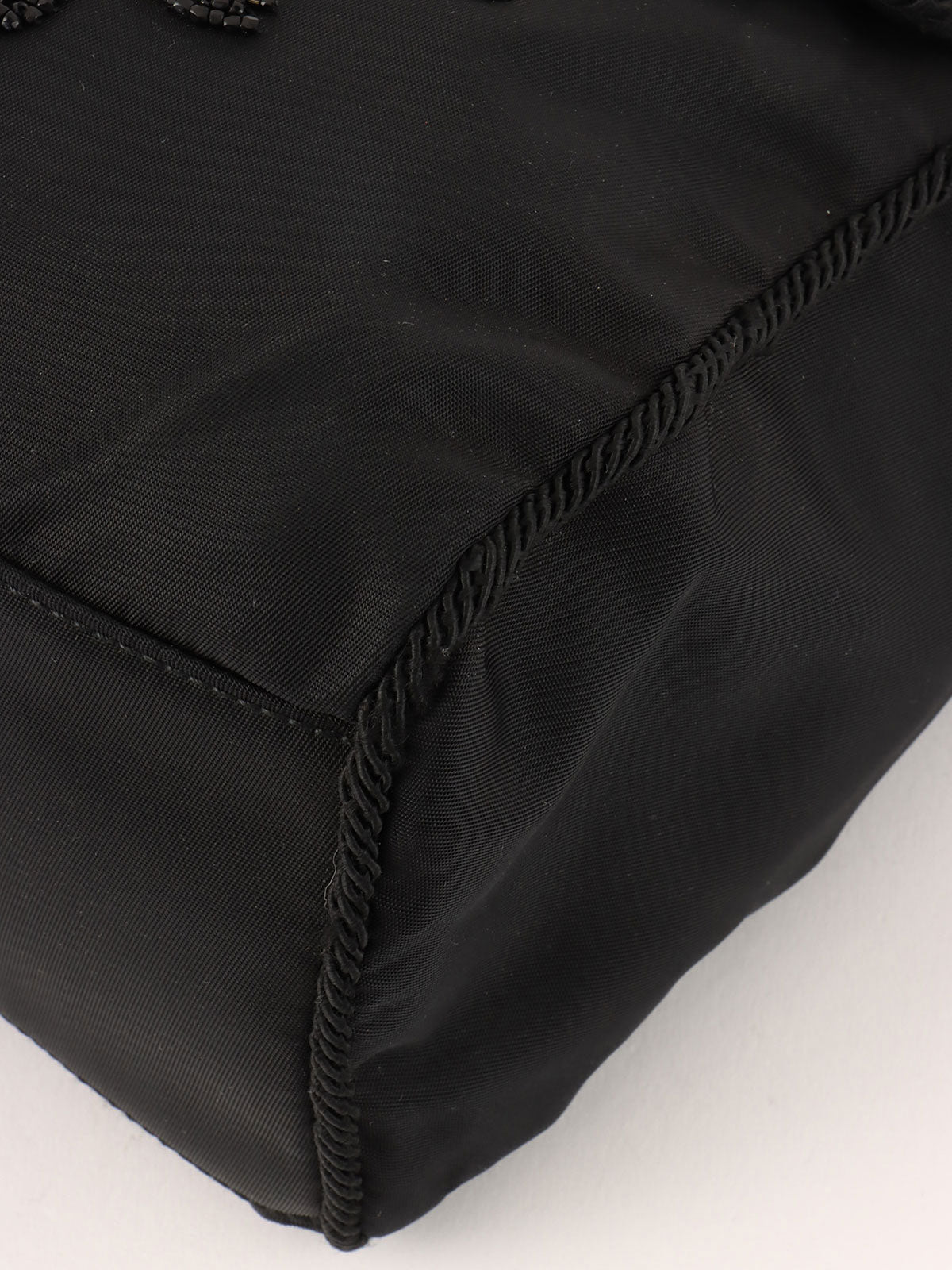 Nylon Tassel Bead Logo Shoulder Bag in Black