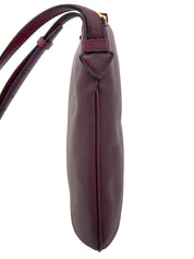 Logo embossed shoulder bag in Bordeaux