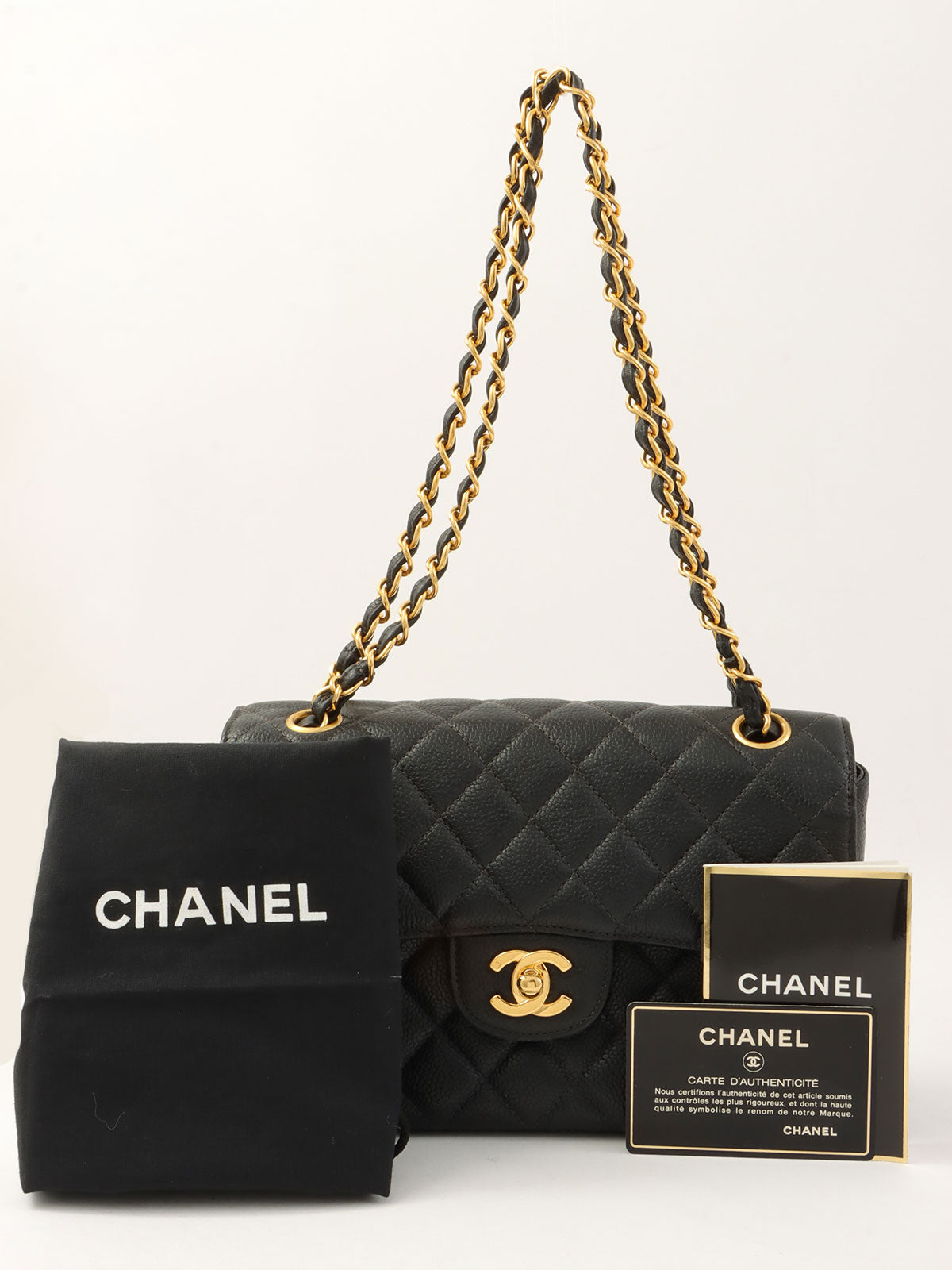 1997 年黑色鱼子酱双面经典翻盖链条包