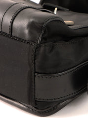 Nylon and leather combination logo plate shoulder bag in black