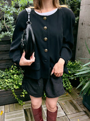 Wool design button collarless jacket in black
