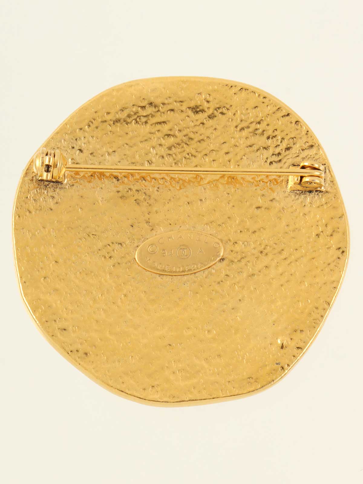 1994 Round Sun Motif CC Mark Brooch Gold