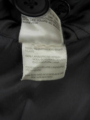Check pattern double-breasted jacket in charcoal gray, white, and black