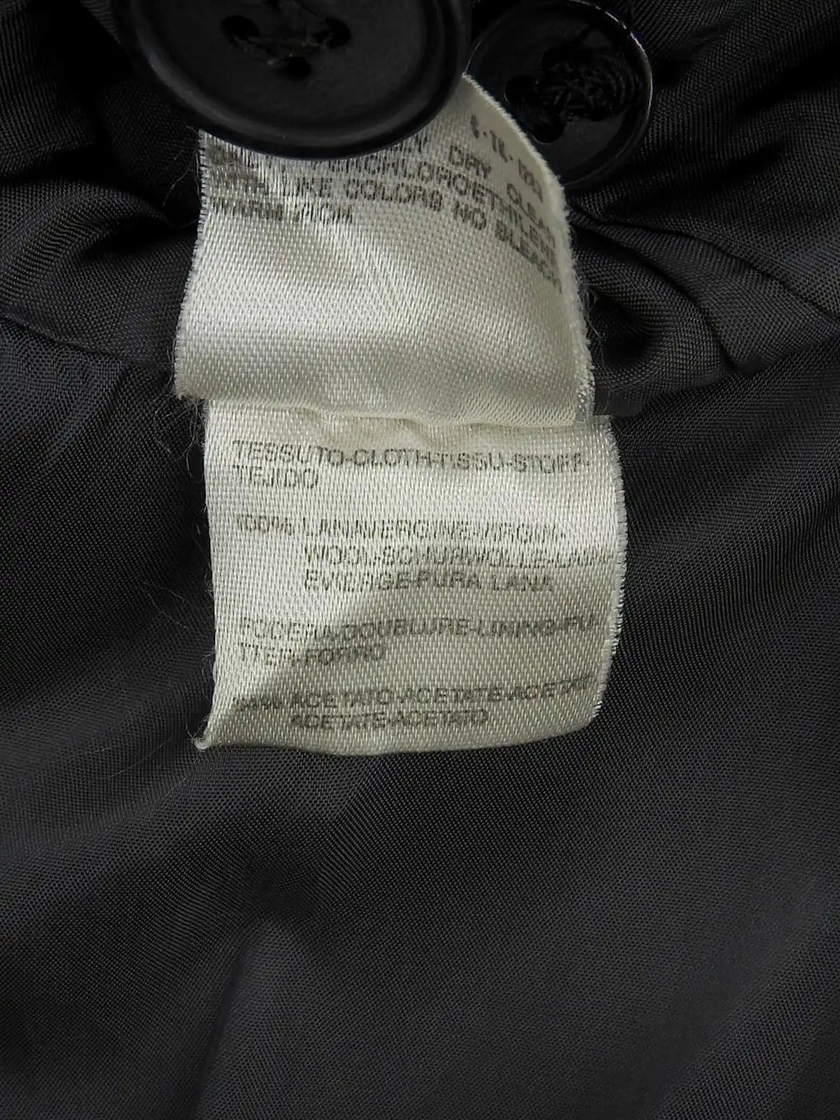 Check pattern double-breasted jacket in charcoal gray, white, and black