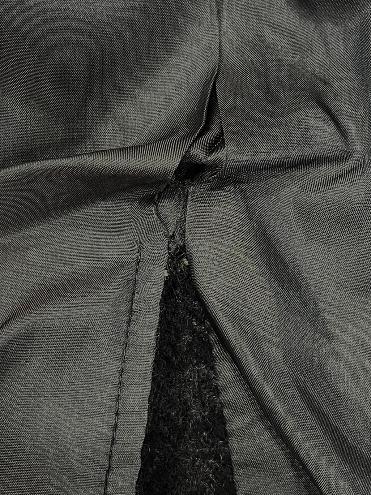 Check pattern double-breasted jacket in charcoal gray, white, and black