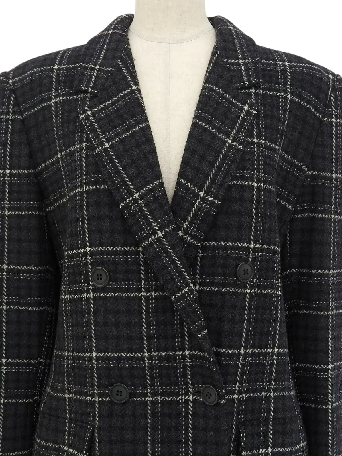 Check pattern double-breasted jacket in charcoal gray, white, and black