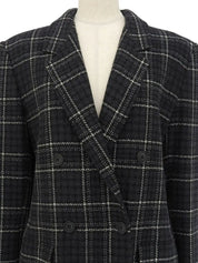 Check pattern double-breasted jacket in charcoal gray, white, and black