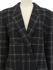 Check pattern double-breasted jacket in charcoal gray, white, and black