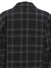 Check pattern double-breasted jacket in charcoal gray, white, and black