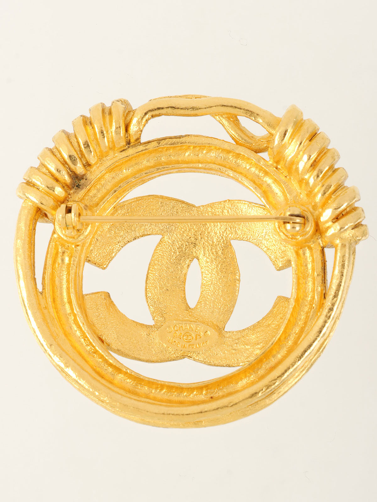 1994 Round Cutout CC Mark Brooch Gold