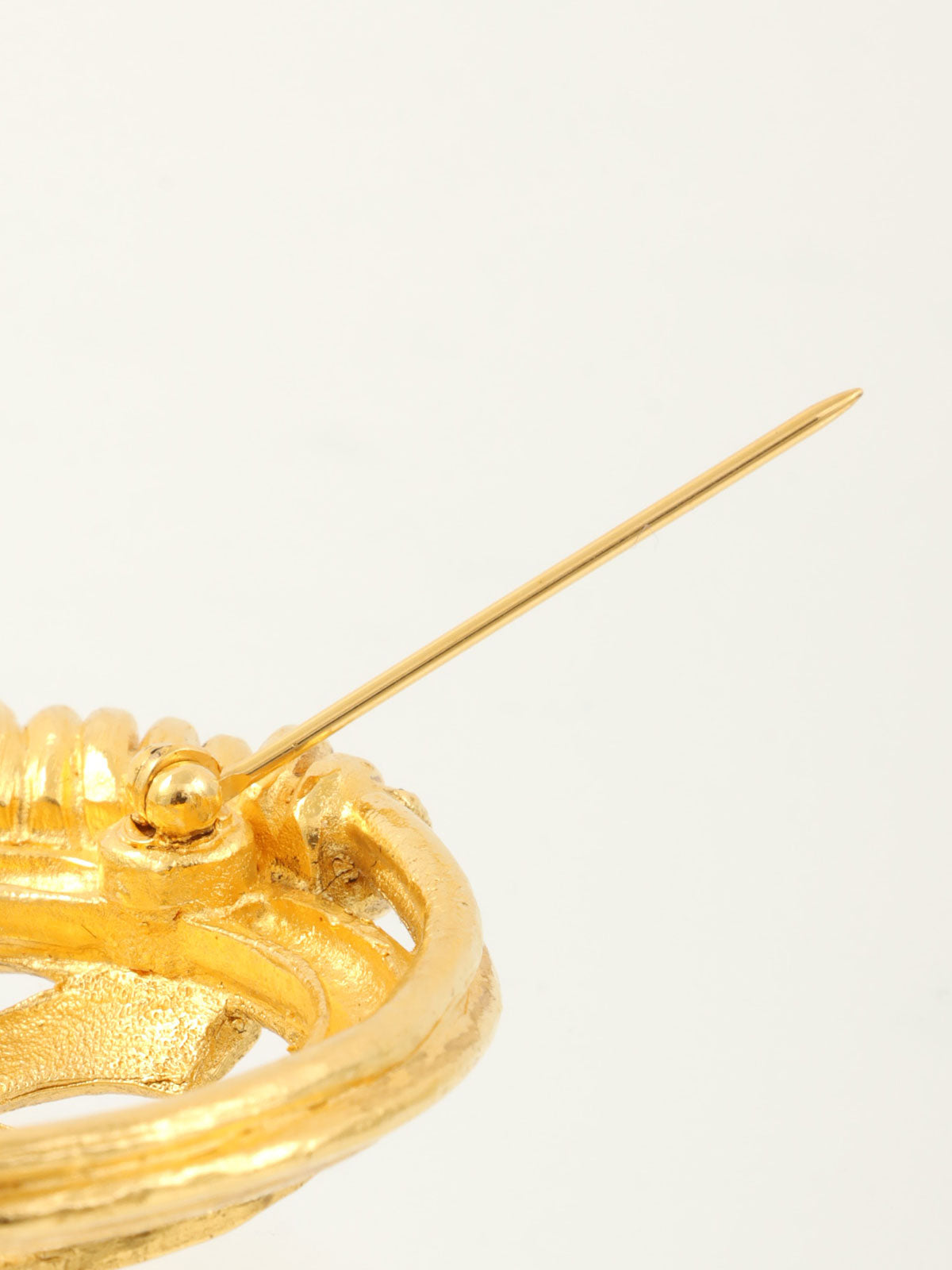 1994 Round Cutout CC Mark Brooch Gold