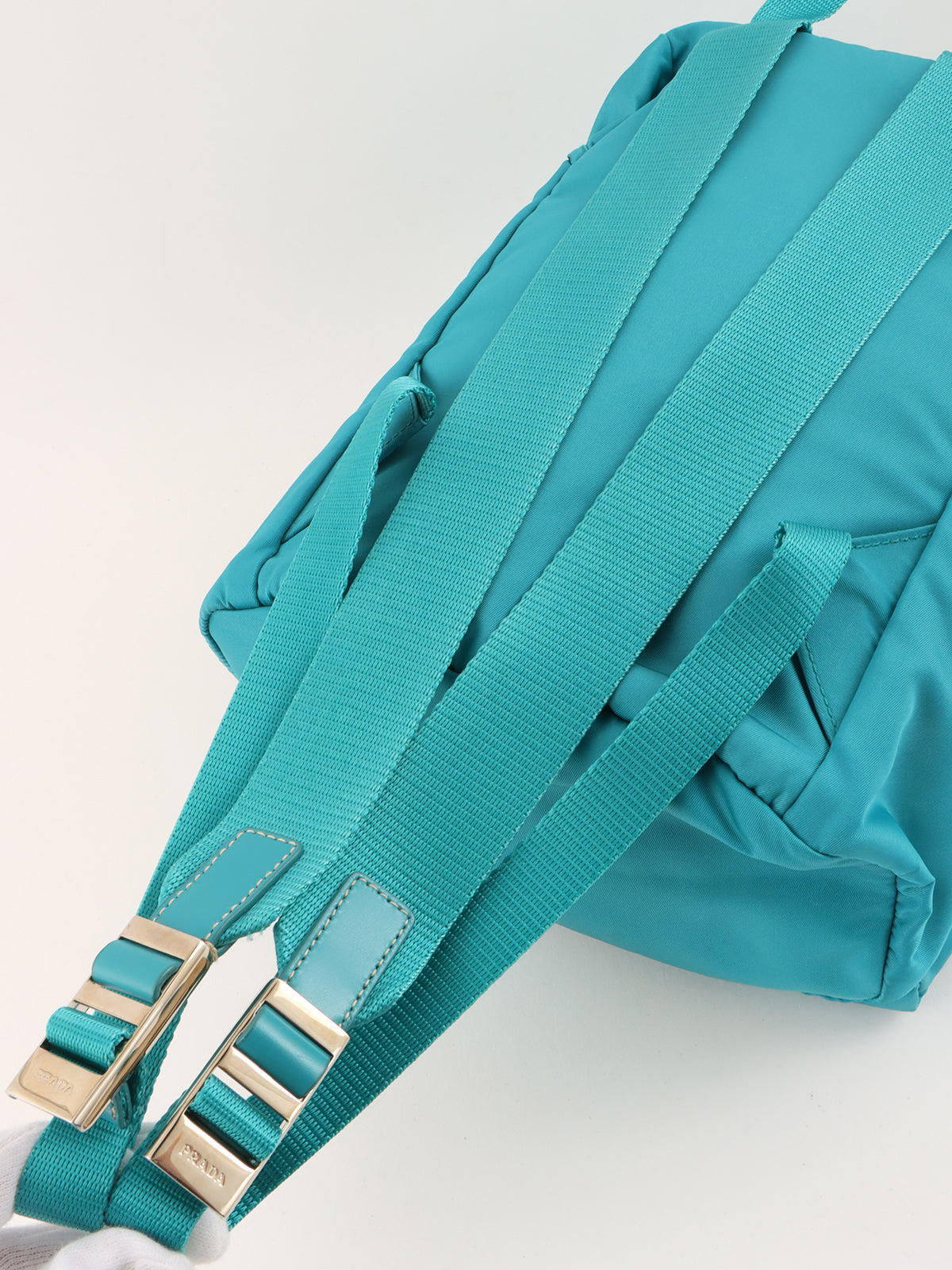 ナイロンロゴプレートバックパック ターコイズブルー