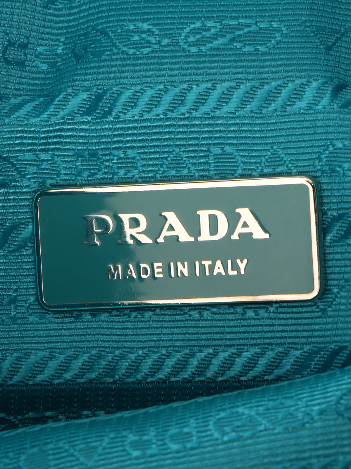 蓝绿色尼龙logo铭牌背包