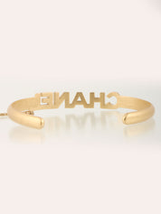 2001年製 CCマークラインストーンリング付きバングル ゴールド