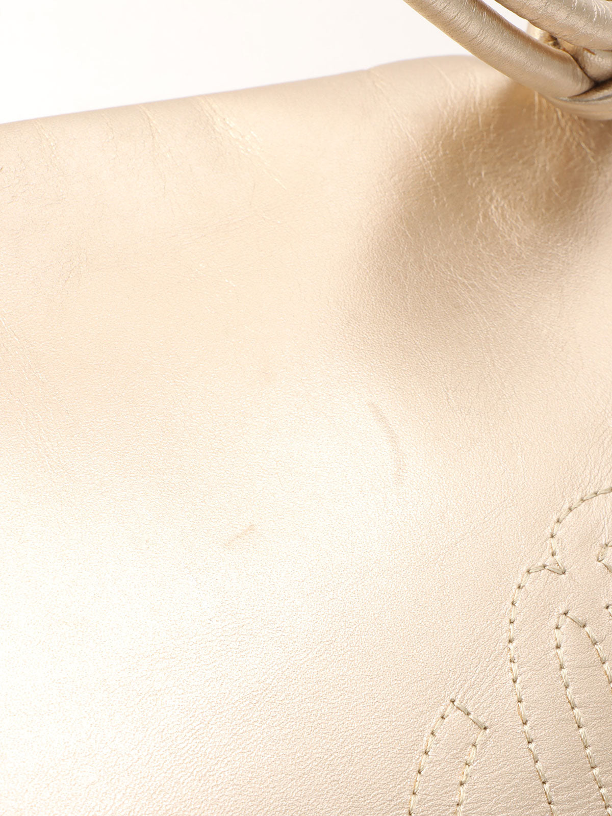Anagram Stitch Handbag in gold