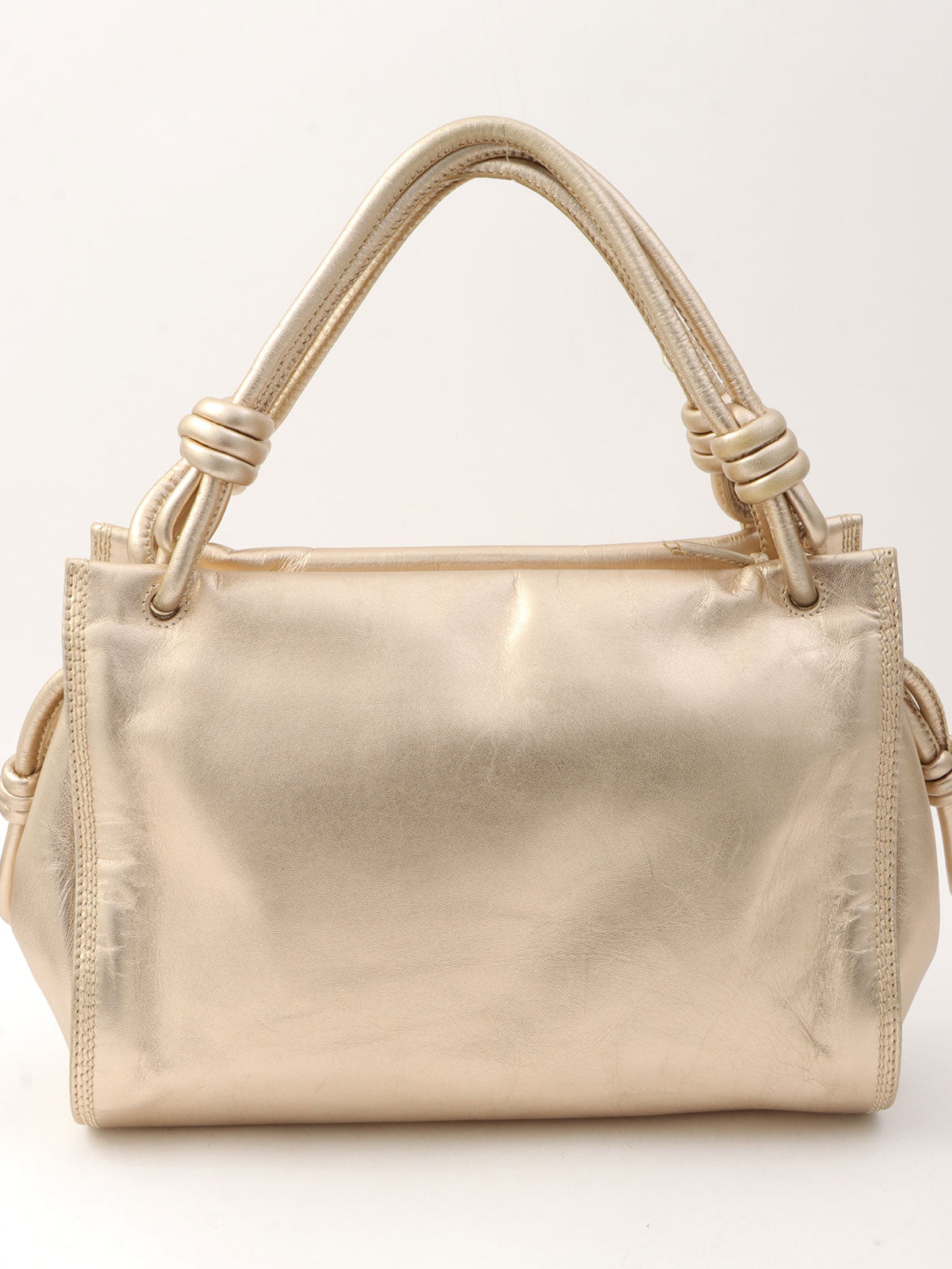 Anagram Stitch Handbag in gold