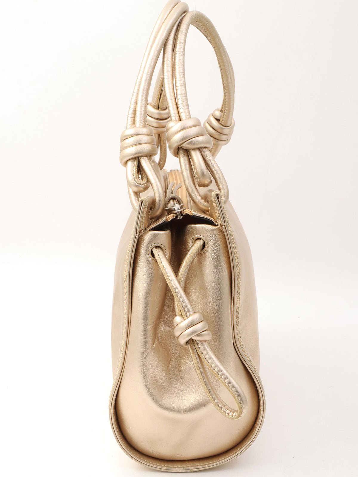 Anagram Stitch Handbag in gold