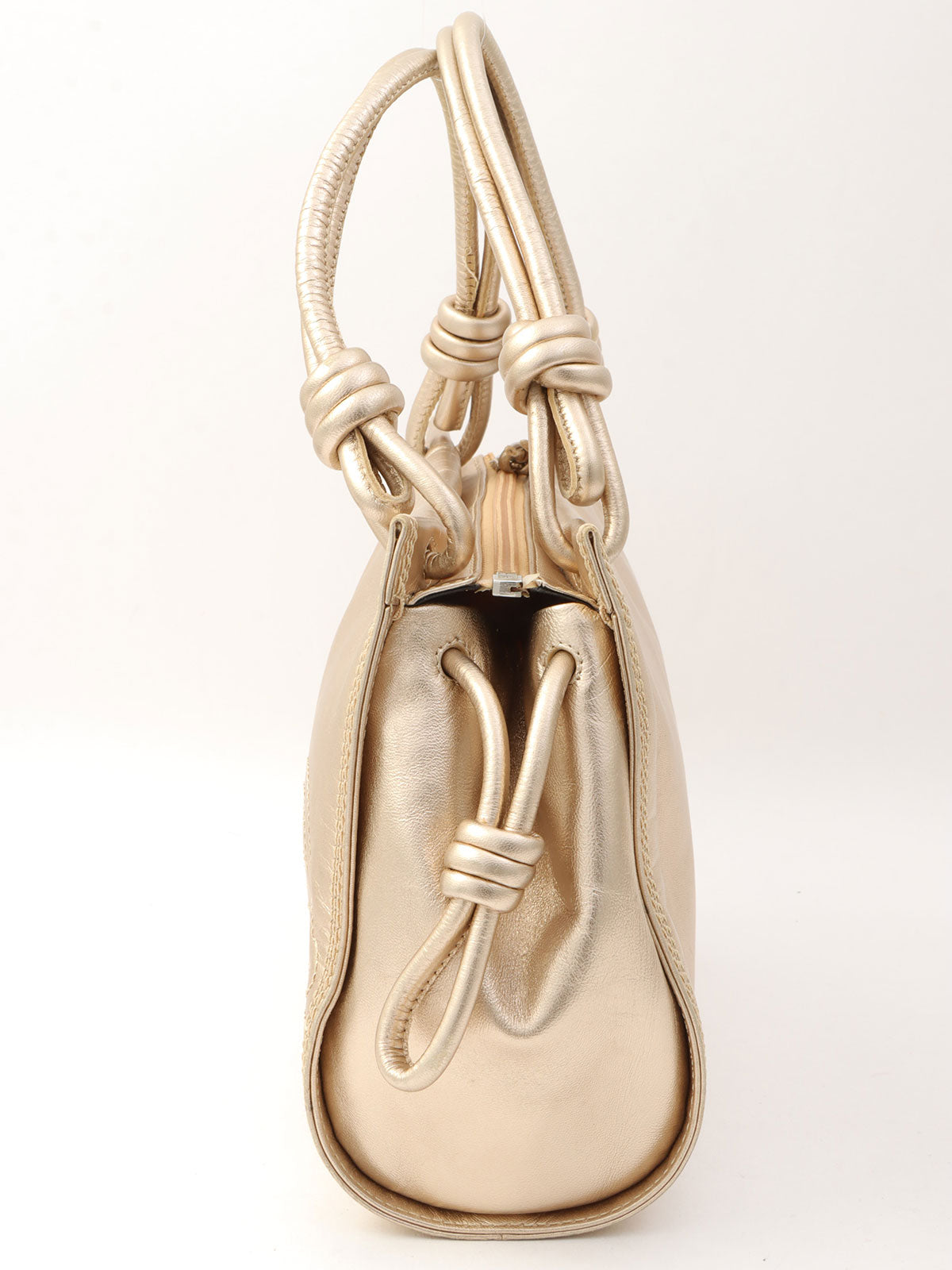 Anagram Stitch Handbag in gold