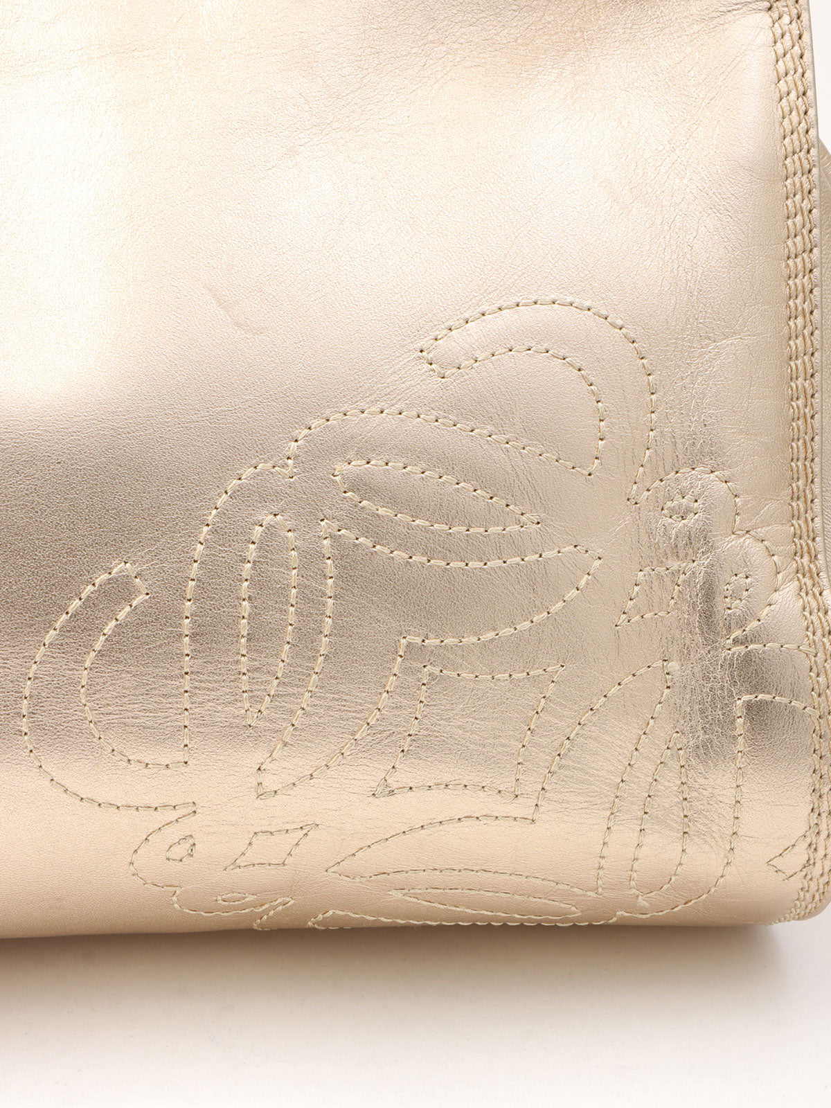 Anagram Stitch Handbag in gold