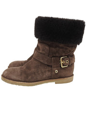 Monogram pattern sheepskin boots in brown