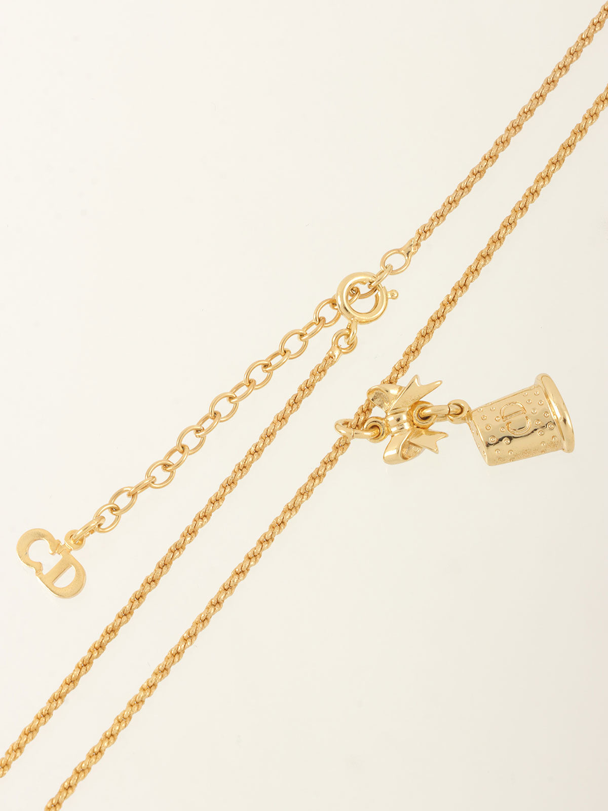 Ribbon Bell Motif Logo Necklace Gold