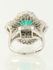Platinum emerald and diamond ring in silver/green