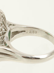 Platinum emerald and diamond ring in silver/green