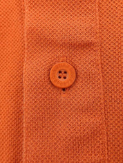 Orange logo embroidered polo shirt