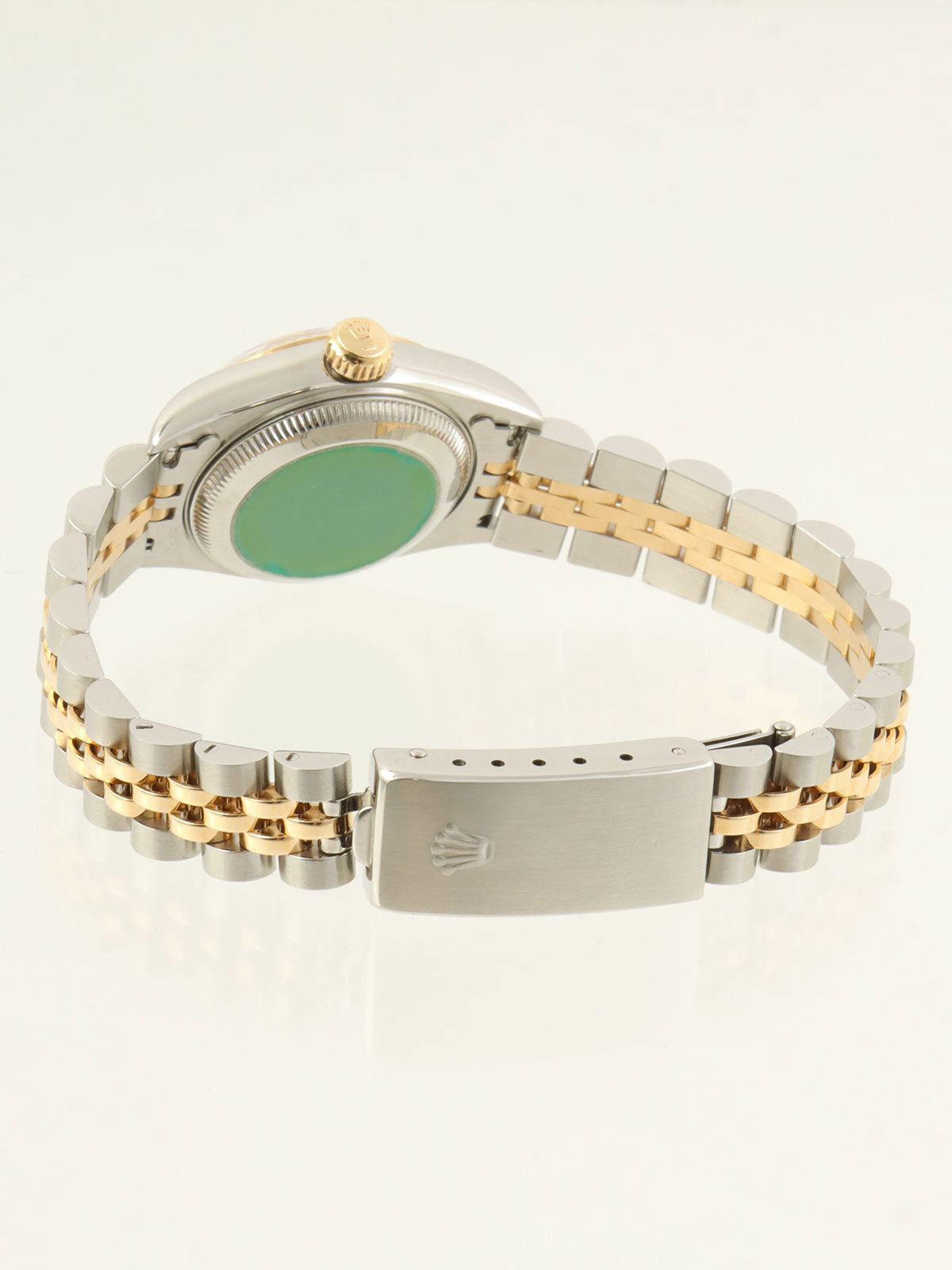 约1993年蚝式恒动日历型腕表，银/金/海军蓝配色。