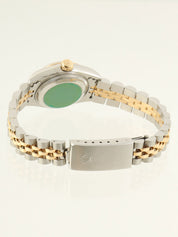 约1993年蚝式恒动日历型腕表，银/金/海军蓝配色。