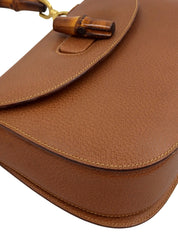 棕色猪皮竹制两用包