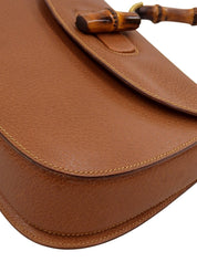 棕色猪皮竹制两用包