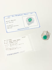 Platinum emerald and diamond 2-way ring in silver/green