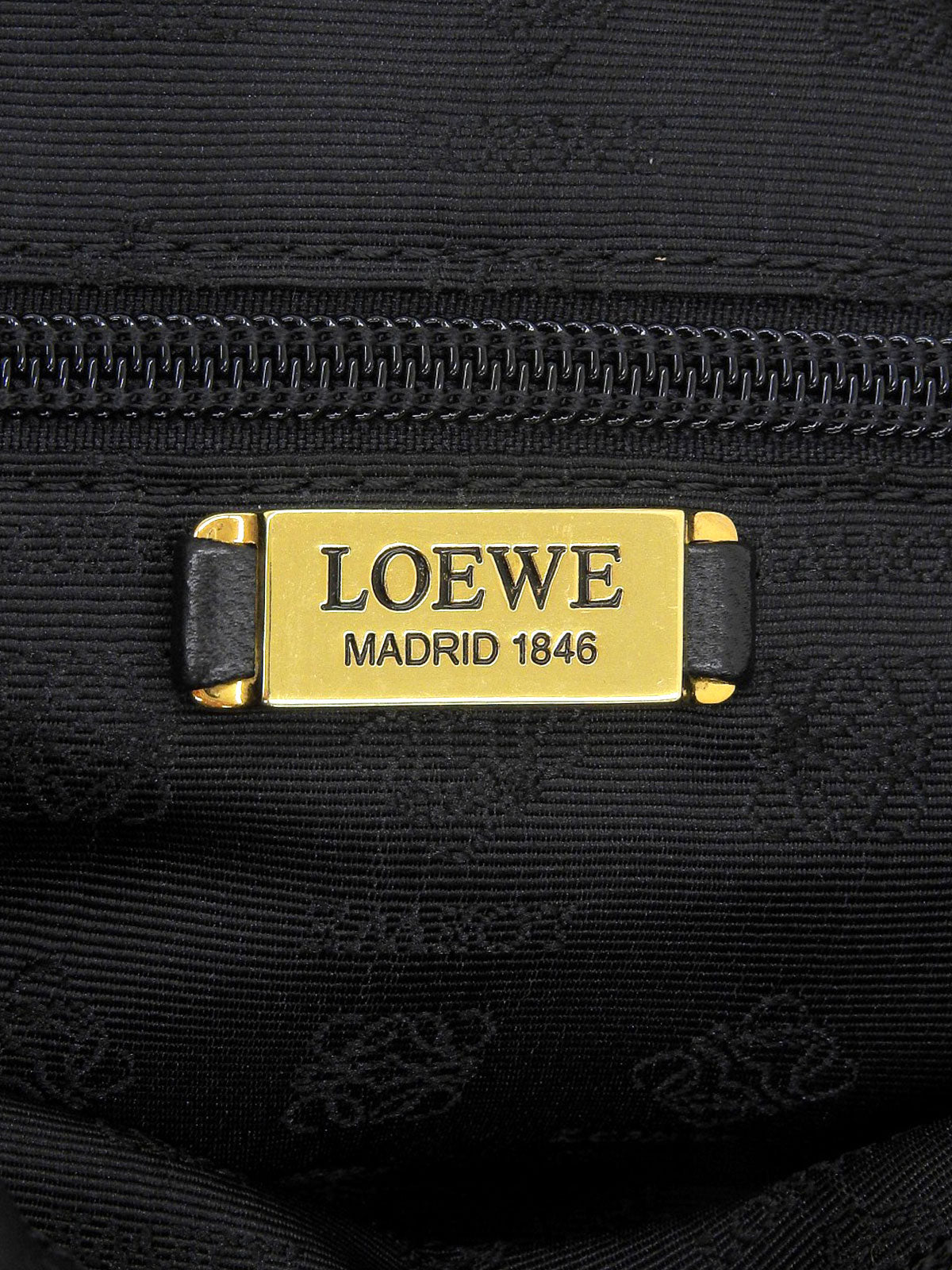 Nappa Anagram Embossed Handbag in Black