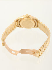 1990-1991年款 10P 钻石蚝式恒动日历型腕表，金/蓝表盘