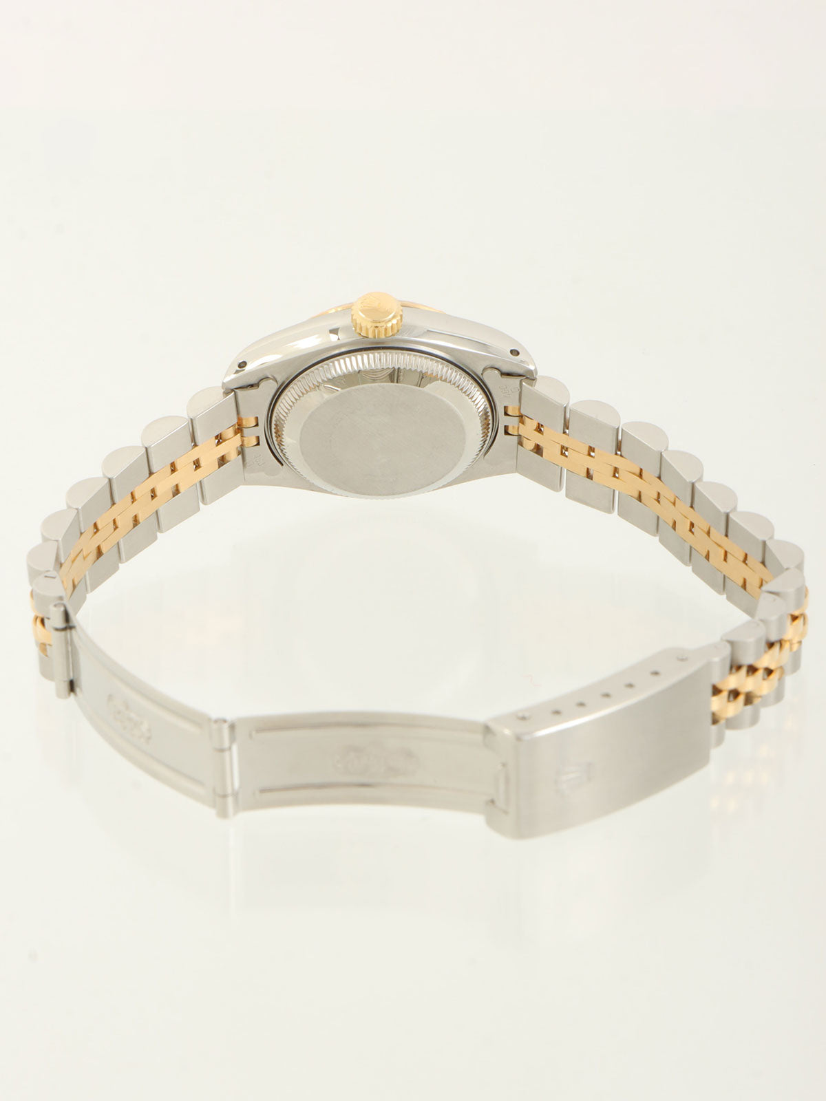 约1991年产蚝式恒动日历型腕表，银/金/海军蓝配色。