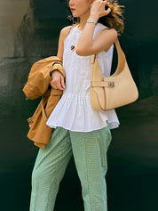 White ruffle sleeveless top