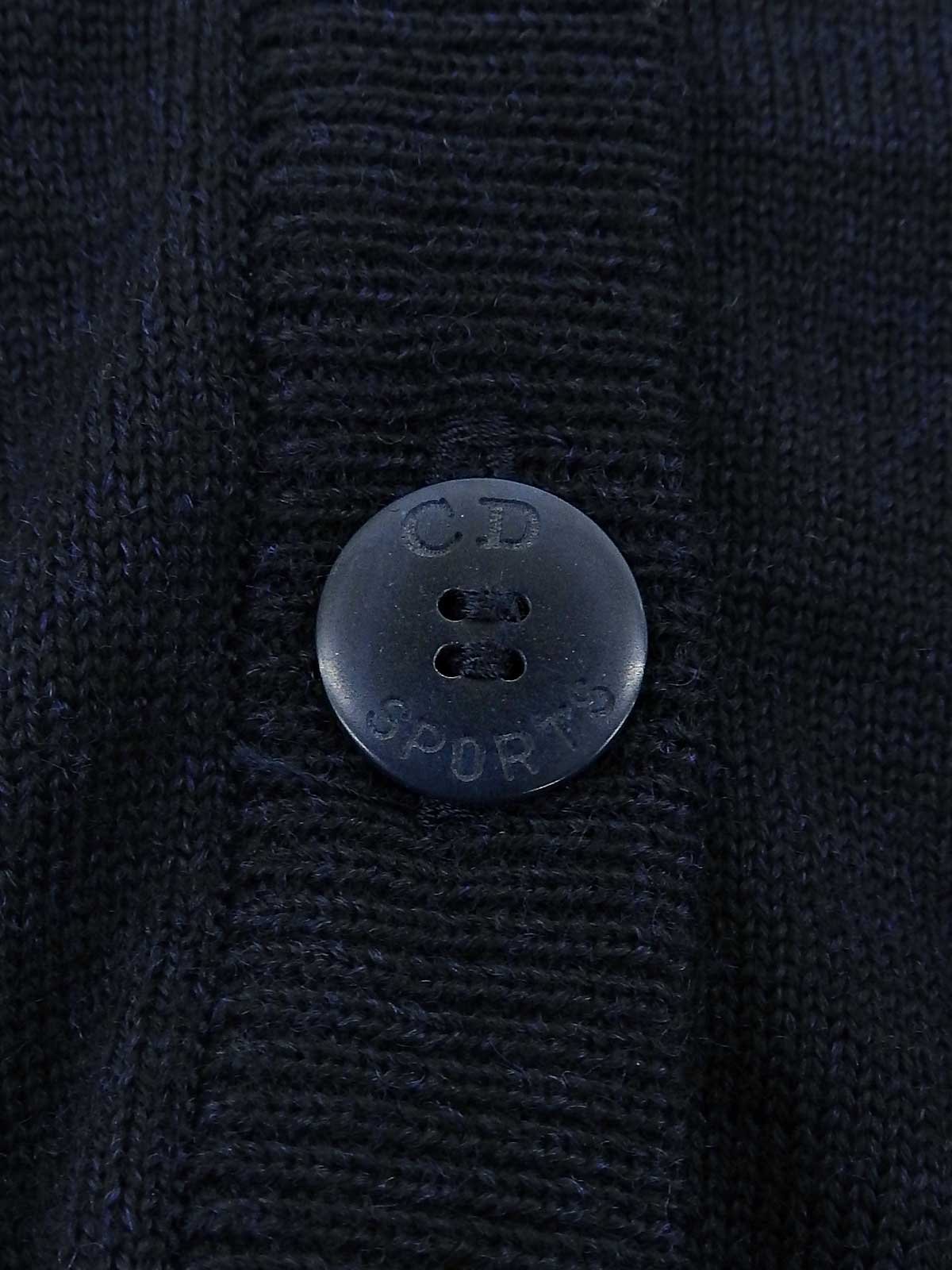 Navy wool knit vest with embroidered logo on the back