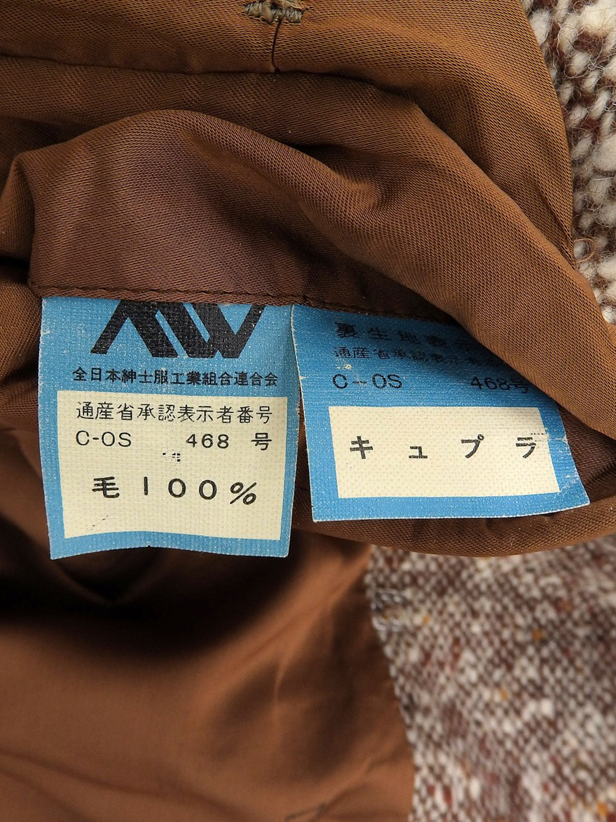 Brown double-breasted tweed coat