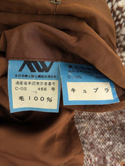 Brown double-breasted tweed coat