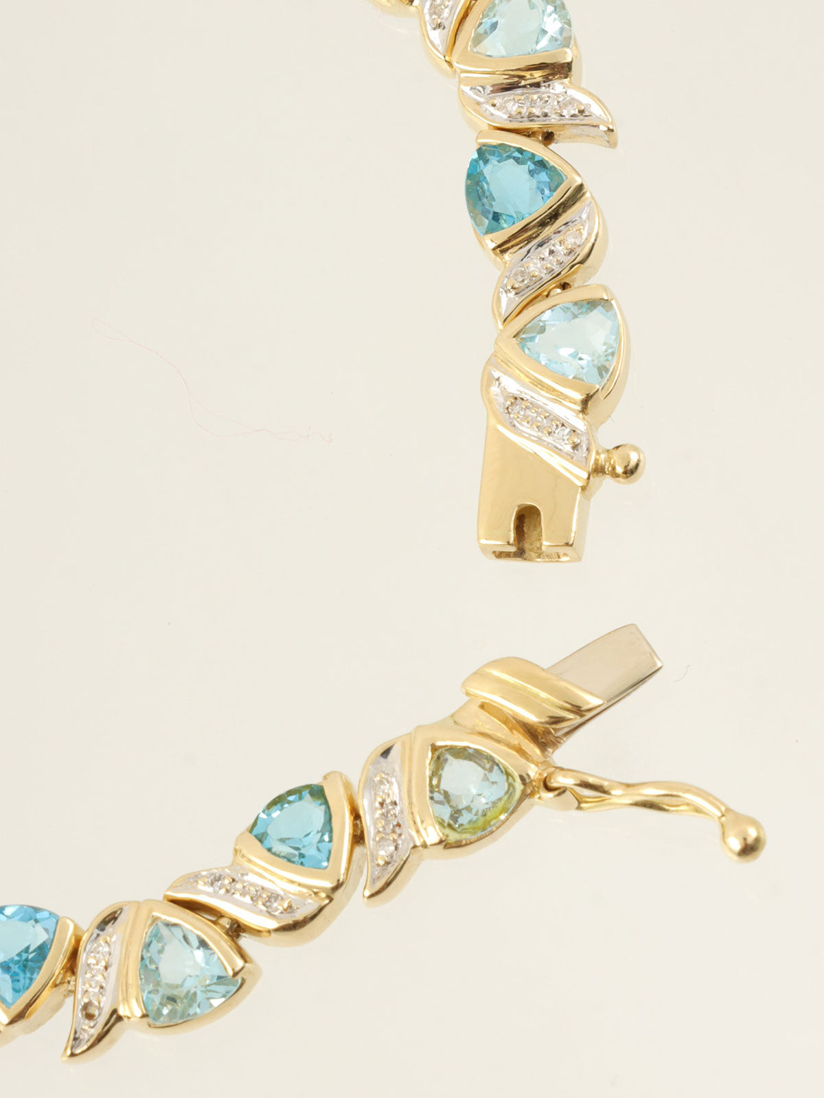 18K金/蓝色托帕石钻石设计手链